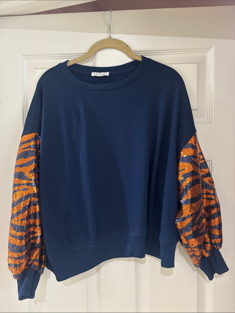 Navy Sweatshirt with Orange Sequin Zebra Balloon Sleeves